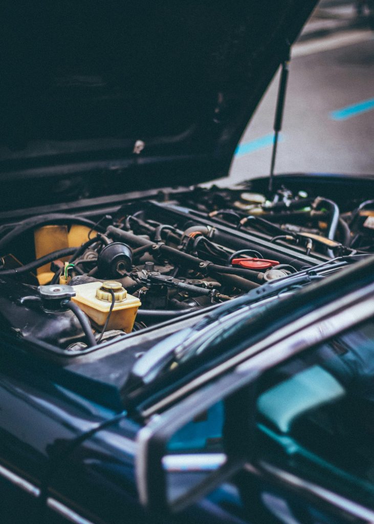 pexels photo 1409999 1409999 Detailed view of an exposed car engine under maintenance in Barcelona.